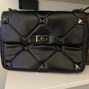 Valentino Garavani Black Leather with Gold Accents